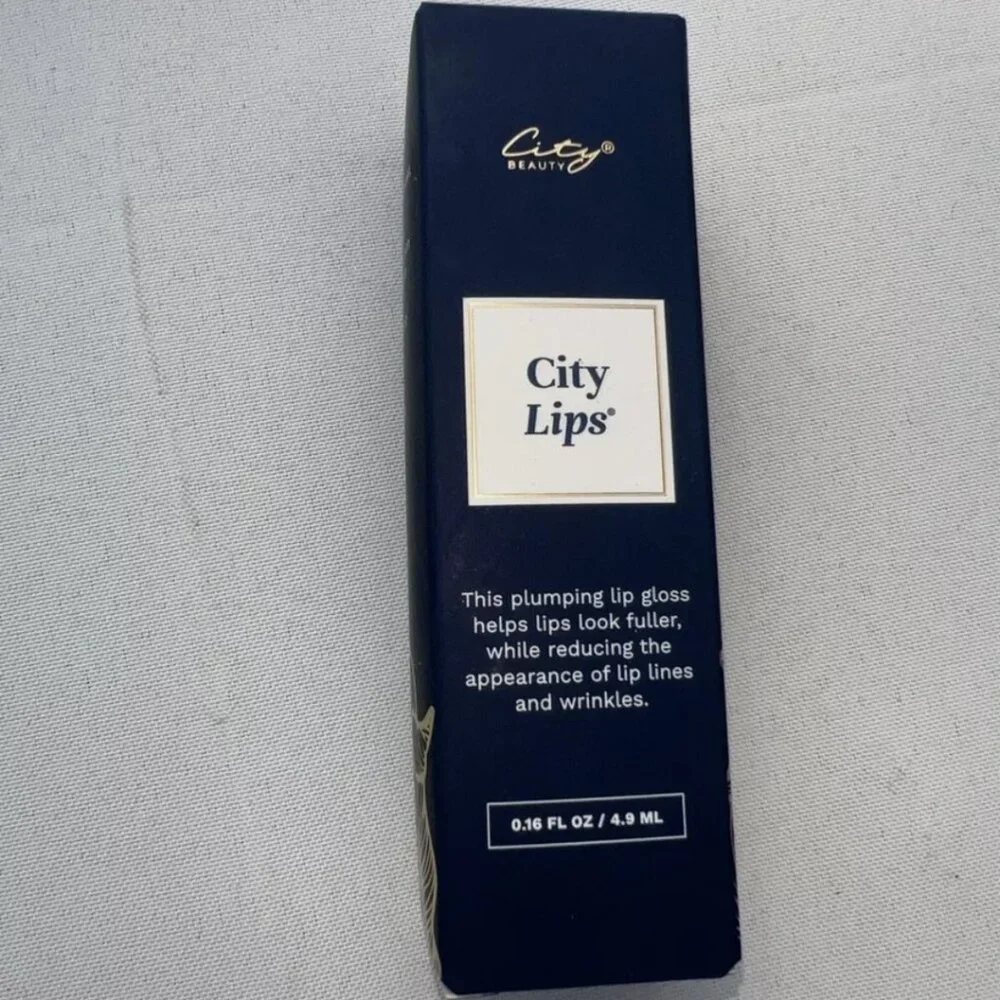 New in box City beauty city lips.  Clear